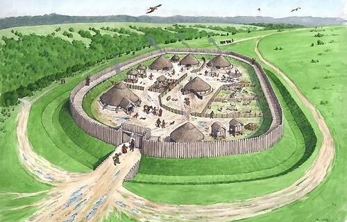Rekonstruktion einer bronzezeitlichen befestigten Siedlung mit Wallanlage
